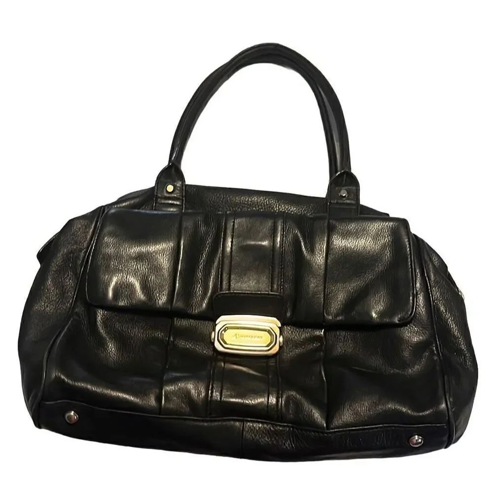 B Makowsky, black bag, purple silky lining great condition